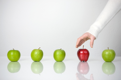 Green and Red apple, a hand