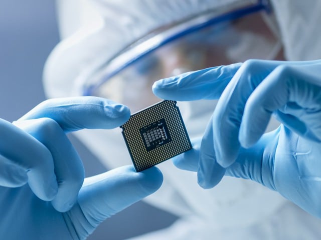 Scientist holding semiconductor