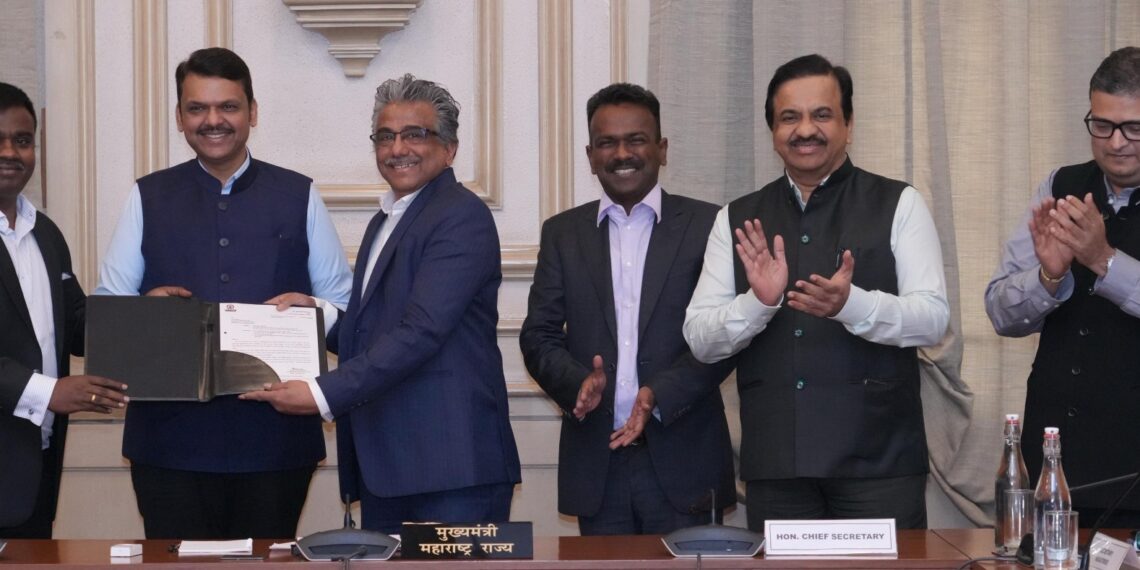 thumbnail_Maharashtra CM Devendra Fadnavis presenting Letter of Comfort for 100 acres to Rajendra Chodankar, Chairman, RRP Electronics