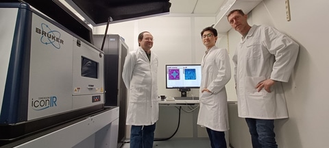 Bruker’s Dimension IconIR system at imec with (left to right) Hartmut Stadler (Bruker), Dowon Kim (imec) and Marcel Laarhoven